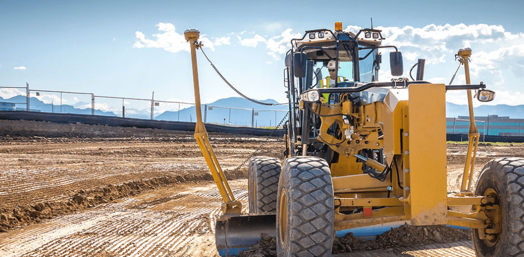 man in a CAT on a construction site